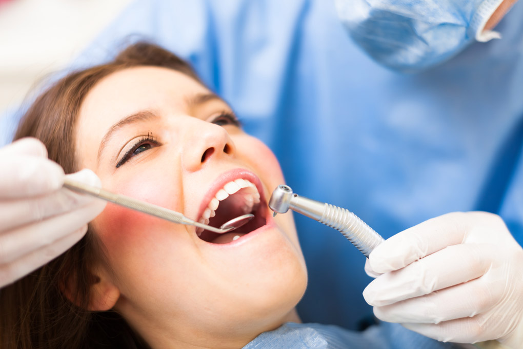 Woman having dental examination